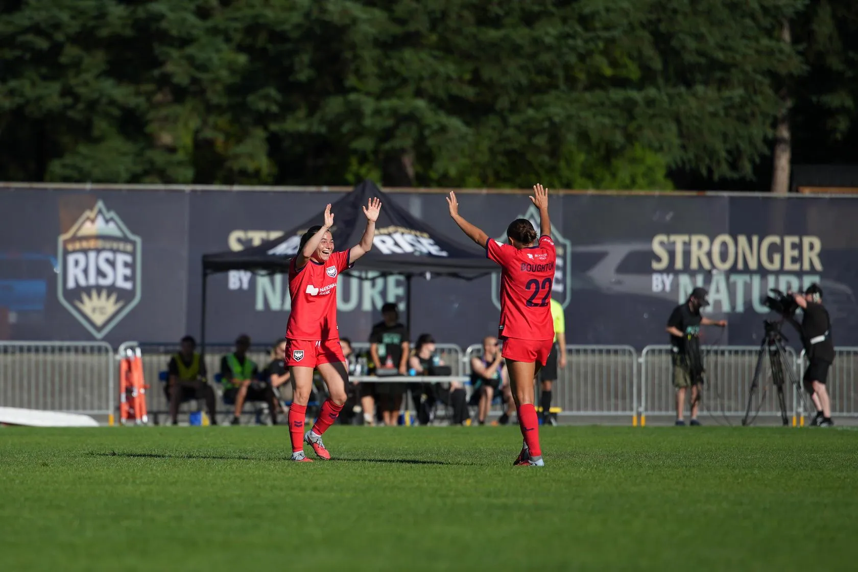 Wild FC players celebrate a win against Vancouver Rise