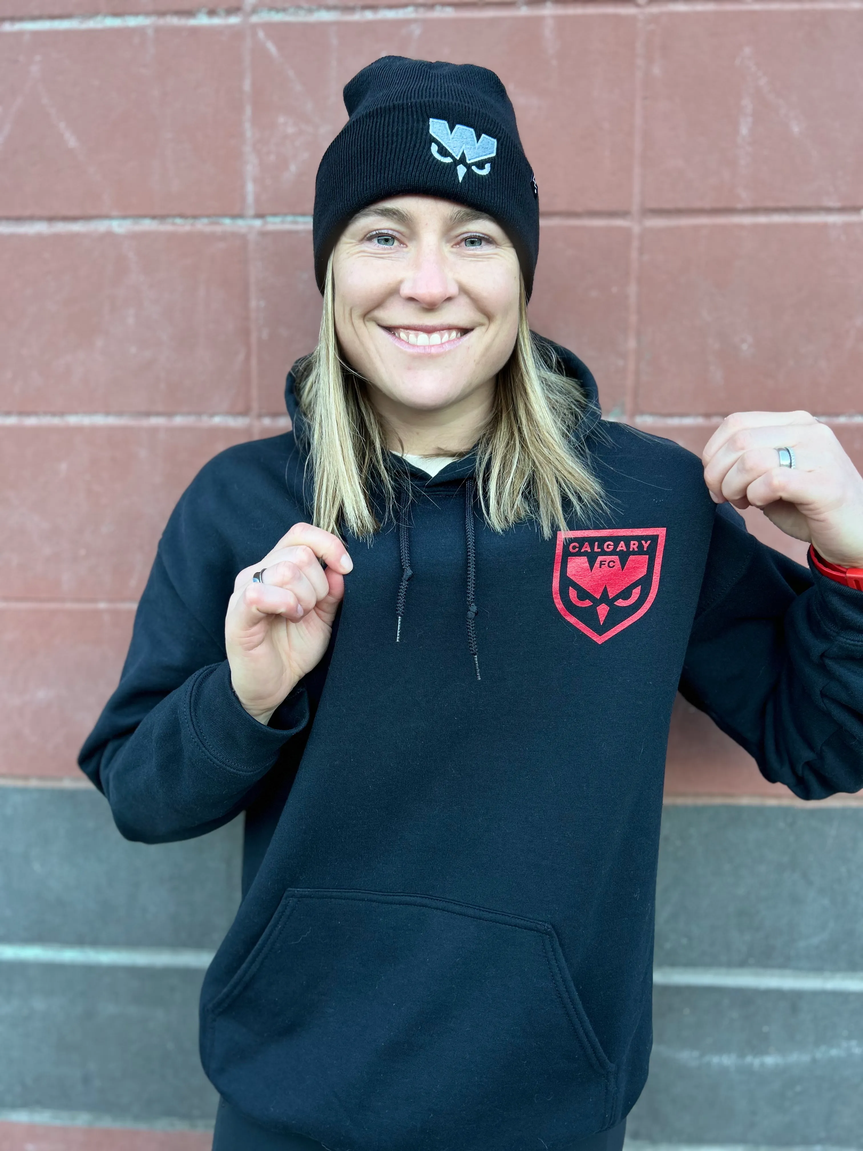 Keilty-Dilling showing off Wild FC merch